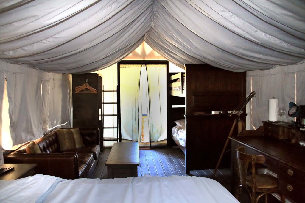Flying Flags Glamping Resort is the perfect blending of roughing it in a tent in the mountains and a posh hotel. Meet in the middle with your loved ones!